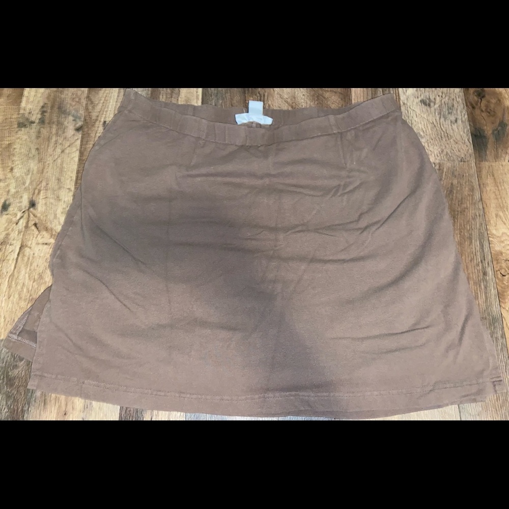 tan skirt, the brand is Style & Co. Woman SPORT, the size is 1X :)